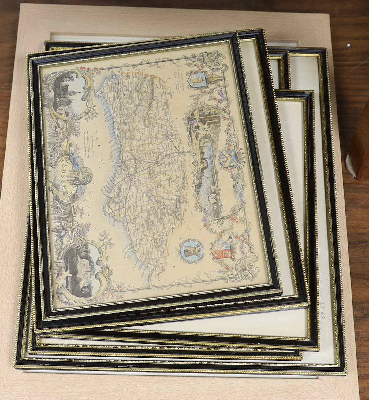 Seven framed Sussex related 18th and 19th century maps, including examples by T. Moule, T. Kitchin, J. Ellis, etc. largest 32 x 22cm